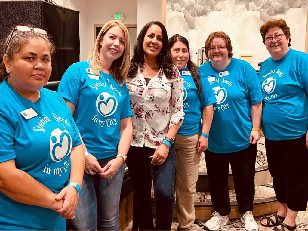 Volunteers smiling for camera at the 7th Annual Health & Wellness Day